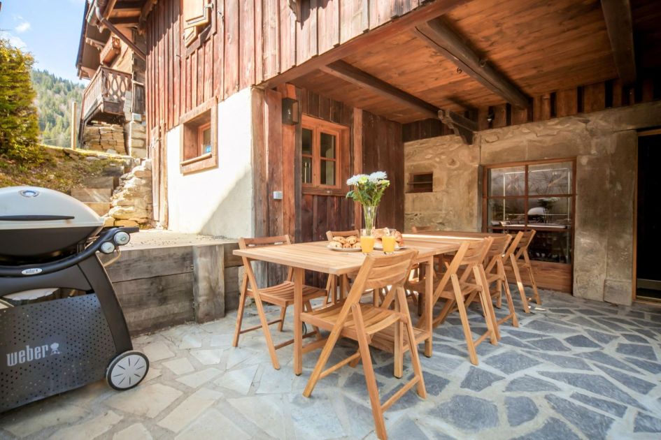 Outside table and BBQ at Chalet Vogue - a fantastic location for luxury mountain biking holidays in Morzine!