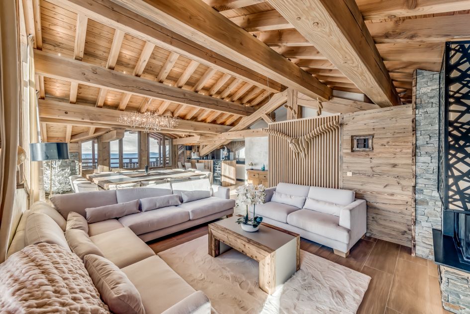 Annapurna Lodge's spacious living room area with vaulted ceilings.