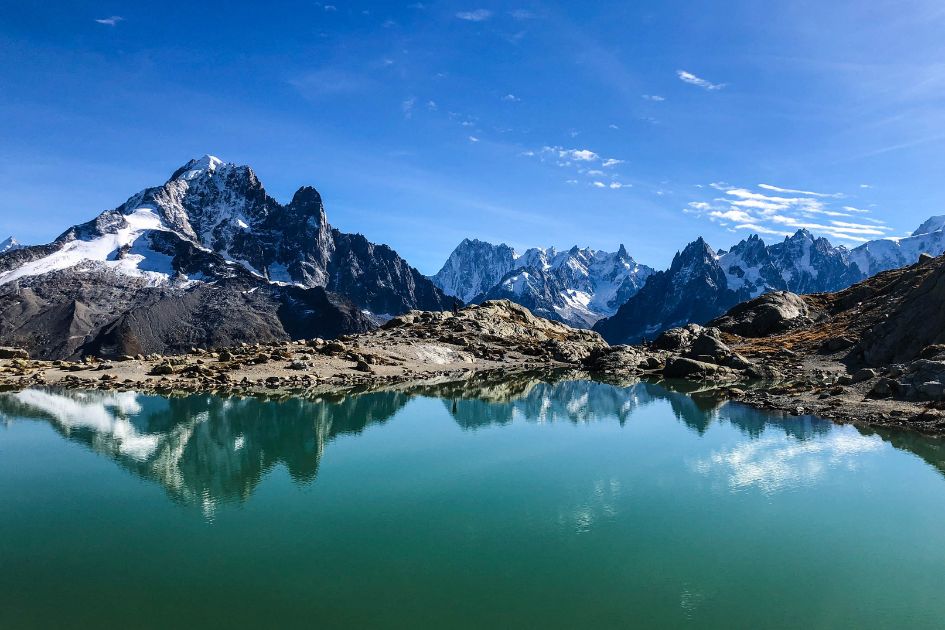 Lac Blanc, with a backdrop of snow-capped mountains in summer in the Alps.