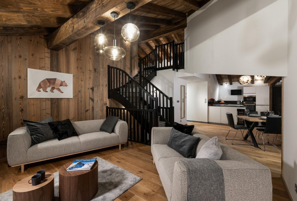 Chalet Alpaga 2 interior, with plush furnishings and a wooden look and feel.